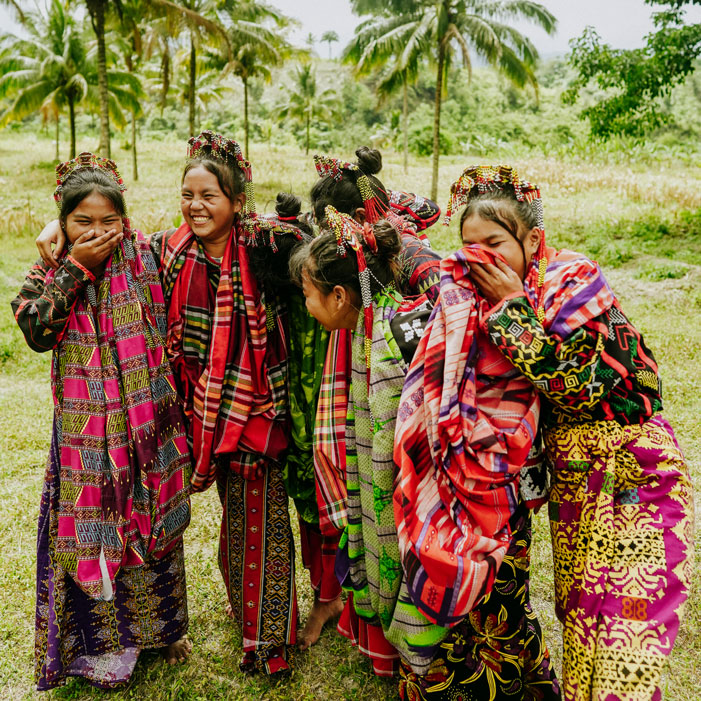 Local students in traditional Filipino attire after performing at a school built with the support of The Vita Coco Project.